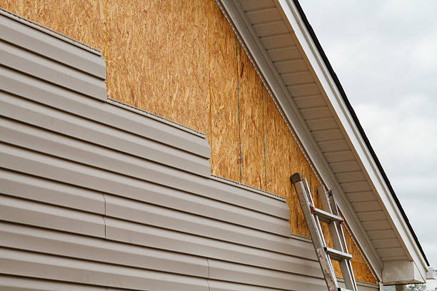 Professional Siding Repair technician working in Coshocton, OH